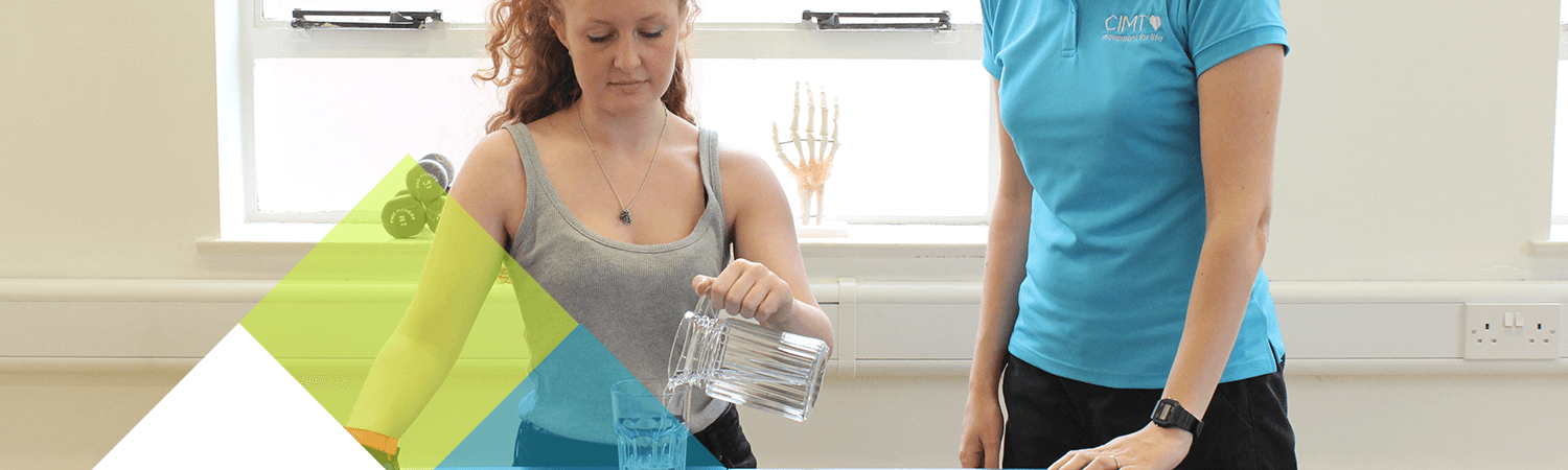 CIMT patient uses jug of water to test an everyday living situation with her constraint mitt