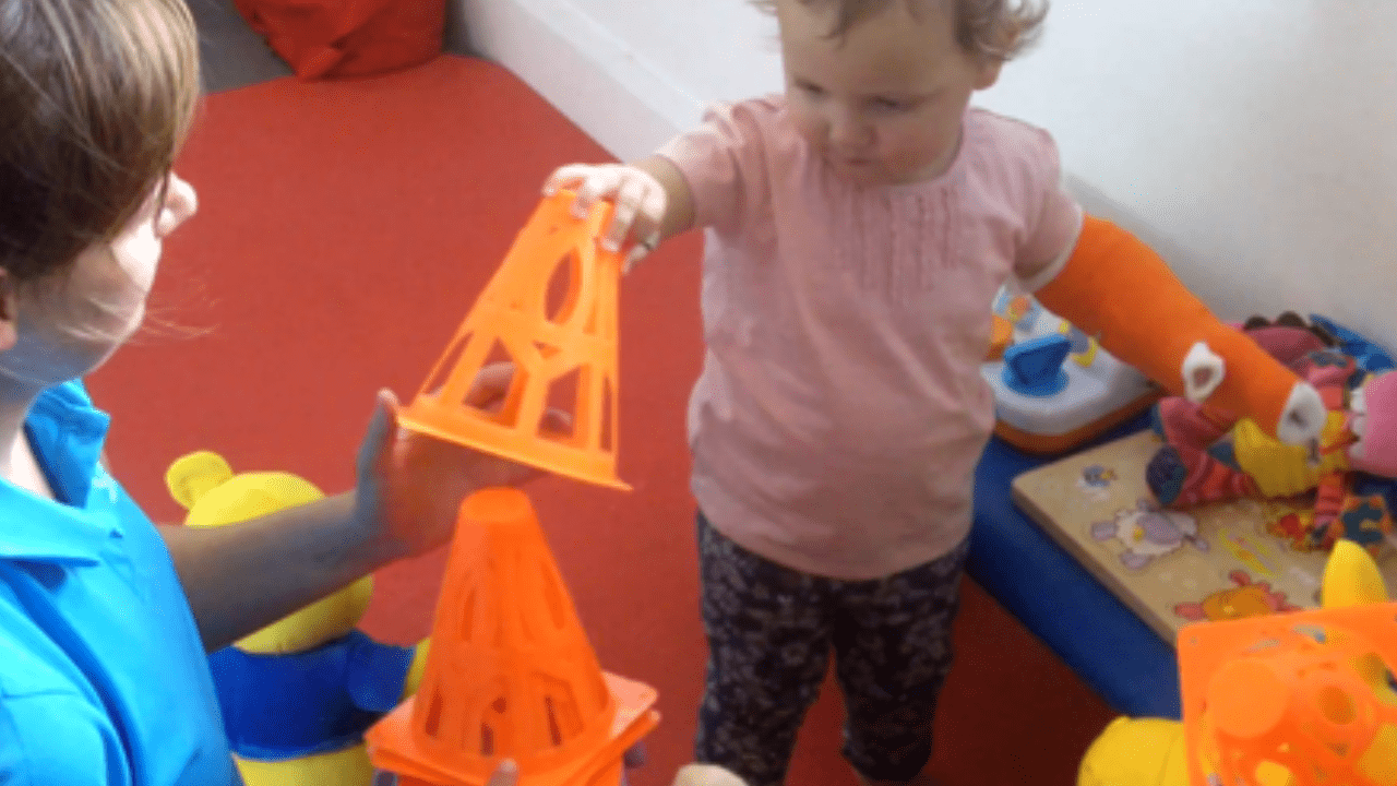 Molly stacking cones.